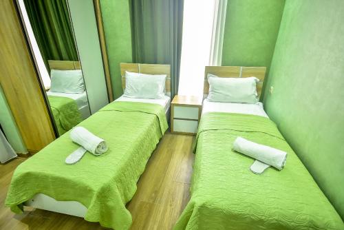 Postel nebo postele na pokoji v ubytování Hotel RANU