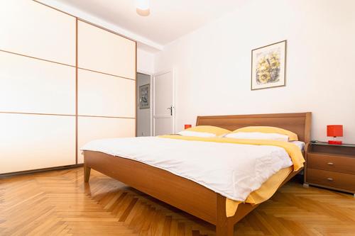 Postel nebo postele na pokoji v ubytování Apartment Vlahov