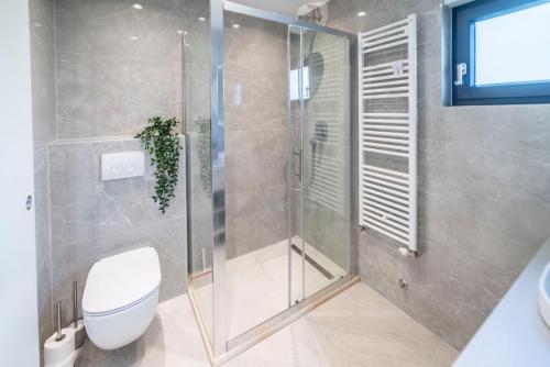 Kúpeľňa v ubytovaní PINNA RESIDENCE - Caretta