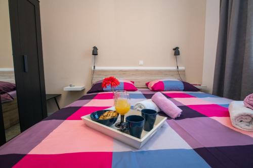 Un pat sau paturi într-o cameră la Apartment Procella