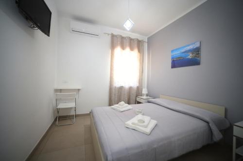 Ένα ή περισσότερα κρεβάτια σε δωμάτιο στο B&B VANNEFORA