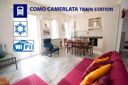ein Wohnzimmer mit einem Sofa und einem Esszimmer in der Unterkunft Casina! in Como