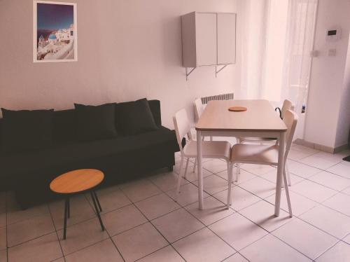 Posedenie v ubytovaní Appartement Cosy en centre centre-ville . . .