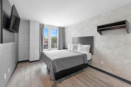 Postel nebo postele na pokoji v ubytování Hotel 365 Bronx - Yankee Stadium