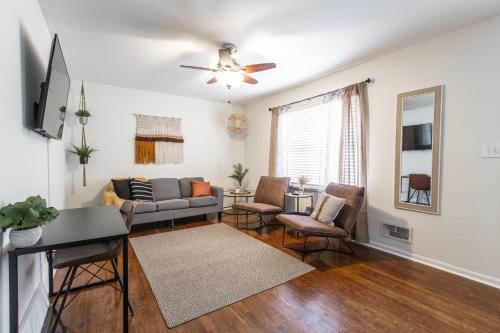 a living room with a couch and chairs at 3 Bedrooms House in Waldo Kansas City in Kansas City