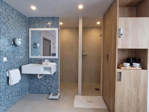 Ein Badezimmer in der Unterkunft Appartements Lamblin