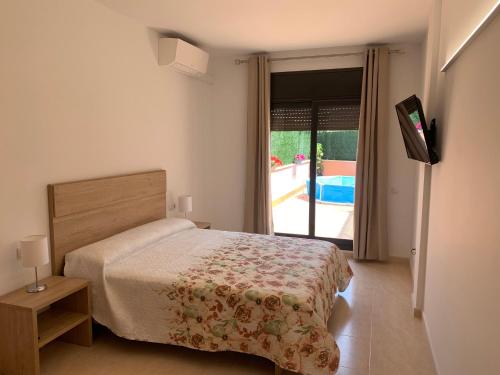 Posteľ alebo postele v izbe v ubytovaní Casa Mires
