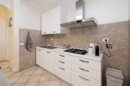 A kitchen or kitchenette at Roma Marine House