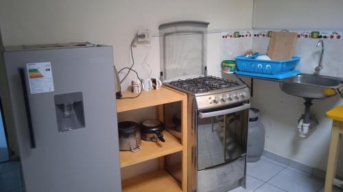 Küche/Küchenzeile in der Unterkunft la casa de los amigos