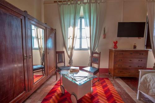 Postel nebo postele na pokoji v ubytování Agriturismo Villa Cavallini