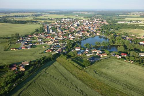 an aerial view of a town and a river at Penzion Rita in Lišov