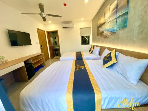 Postel nebo postele na pokoji v ubytování Aloha Hotel Vung Tau
