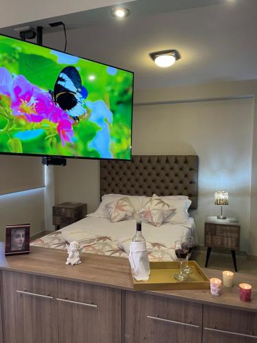 Ένα ή περισσότερα κρεβάτια σε δωμάτιο στο Apart-hotel Villakayro