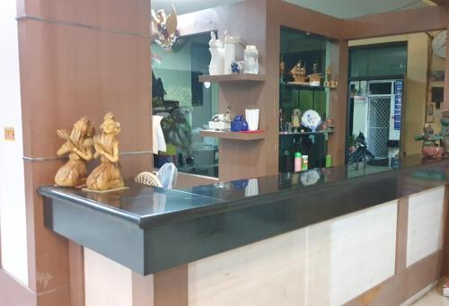 Kuchyň nebo kuchyňský kout v ubytování Hotel Suroyo RedPartner