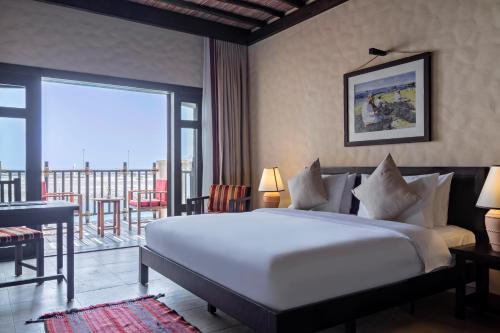 Postel nebo postele na pokoji v ubytování Atana Musandam Resort