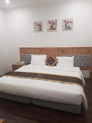 Postel nebo postele na pokoji v ubytování Korea 2 Hotel Bac Giang