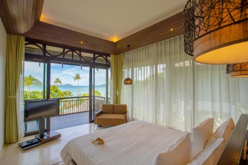 Postel nebo postele na pokoji v ubytování The Vijitt Resort Phuket - SHA Extra Plus