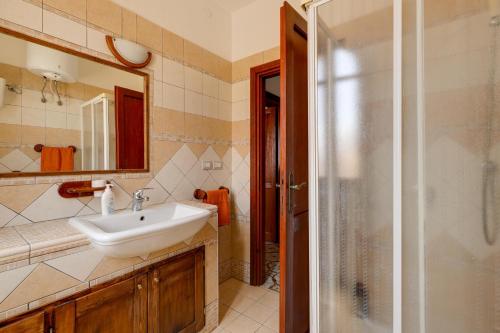 Ванная комната в La Terrazza sul Mare