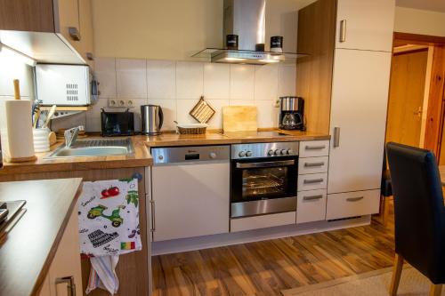 Η κουζίνα ή μικρή κουζίνα στο Ferienwohnung im Souterrain