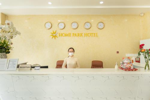 a woman wearing a mask in a home park hotel at Home Park Hotel in Phu Quoc