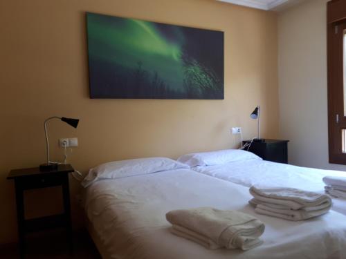 Кровать или кровати в номере Felechosa ski & senderismo