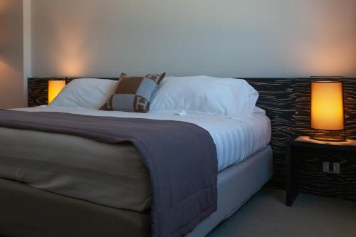 Postel nebo postele na pokoji v ubytování G Hotel Ancona