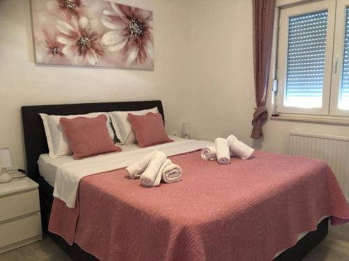 Postel nebo postele na pokoji v ubytování Villa Mir Pridraga