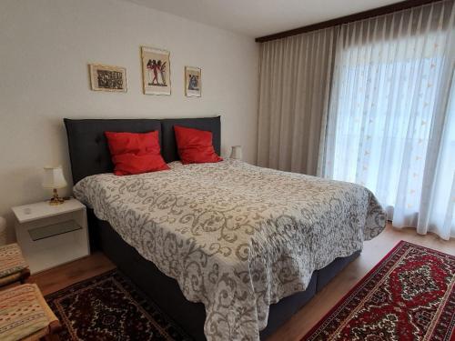 Postel nebo postele na pokoji v ubytování Abschalten vom Alltag in Brissago