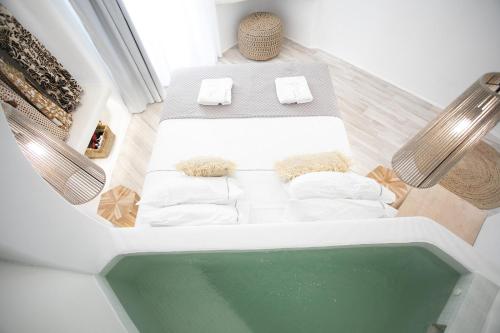 an overhead view of a bath tub in a room at Majestique of Naxos in Naxos Chora