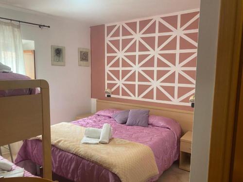 Кровать или кровати в номере Affittacamere Le Rondini