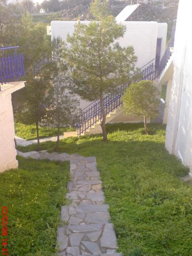 Фотография из галереи Aetos Beach Bungalows в Каристосе