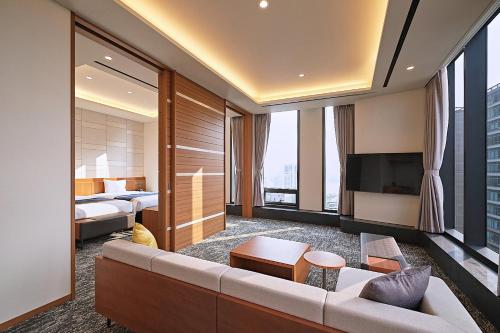โทรทัศน์และ/หรือระบบความบันเทิงของ Roynet Hotel Seoul Mapo