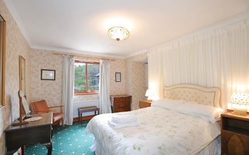 Ένα ή περισσότερα κρεβάτια σε δωμάτιο στο Green Hope Guest House