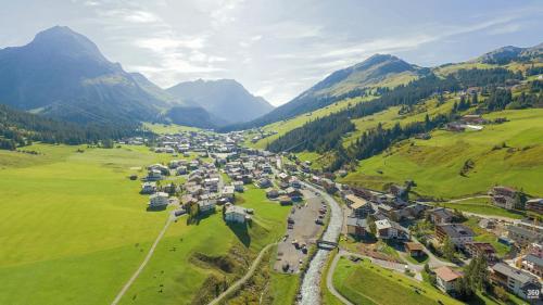 an aerial view of a village in the mountains at Haus Schrofenstein in Lech am Arlberg