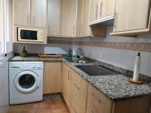 Kuchyň nebo kuchyňský kout v ubytování Apartamento cerca del centro histórico de Málaga II