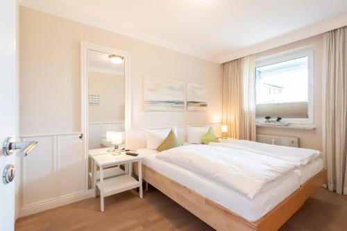 Ένα ή περισσότερα κρεβάτια σε δωμάτιο στο Appartement Syltbrise