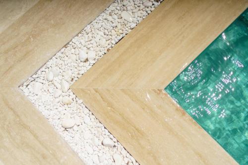 a close up of a floor with rocks on it at Costa Maya Bodrum in Bodrum City
