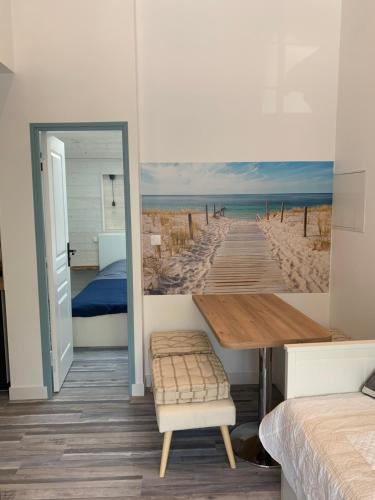 Poschodová posteľ alebo postele v izbe v ubytovaní T2 vue sur le parc proche mer et île de ré