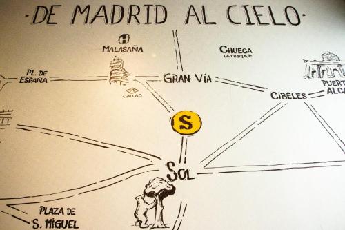 a drawing of a map with a dollar sign on it at Onefam Sungate in Madrid