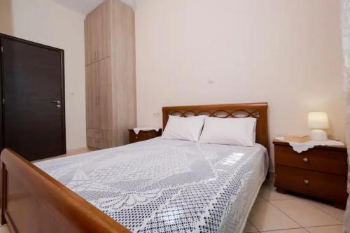 Ένα ή περισσότερα κρεβάτια σε δωμάτιο στο Nikis Apartments Kisamos