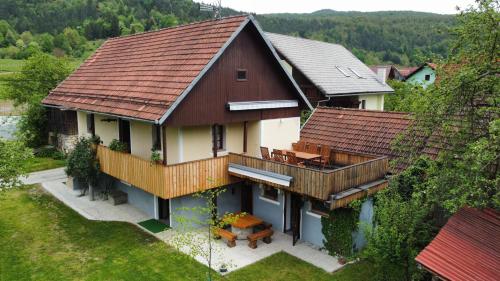 an aerial view of a house with a roof at Vineyard cottage Kolpa Zupančič in Stari Trg ob Kolpi