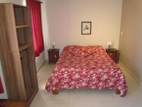 Ένα ή περισσότερα κρεβάτια σε δωμάτιο στο Le Marronnier