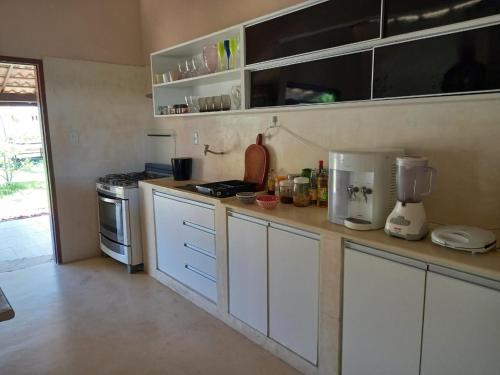 Kuchyň nebo kuchyňský kout v ubytování Uma Casa para o Descanso!
