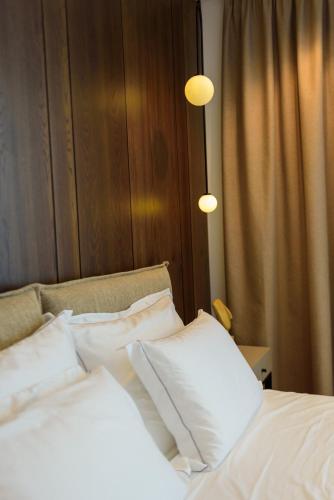 Nobus Hotel & Spaにあるベッド
