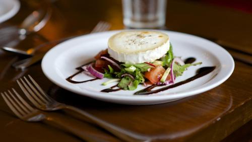 a white plate with a sandwich on a table at The Seal in Selsey