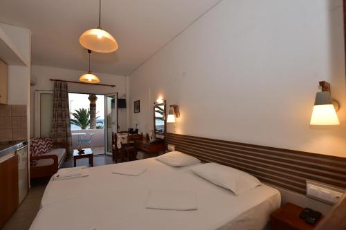Ένα ή περισσότερα κρεβάτια σε δωμάτιο στο Morpheas Rooms