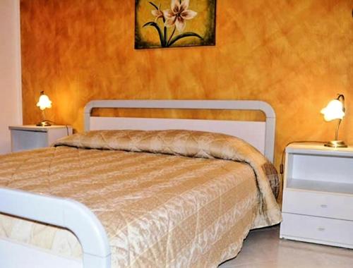 Posteľ alebo postele v izbe v ubytovaní 2 bedrooms appartement with furnished balcony and wifi at San Vito Lo Capo
