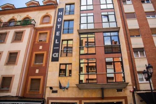 a facade of a building with windows at Hotel Alda Centro Oviedo in Oviedo