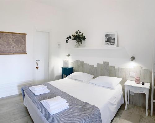 Postel nebo postele na pokoji v ubytování Villa Volli Three Rooms