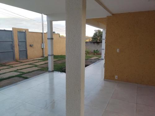 an empty porch of a house with a pillar at SO HAM Guest House in Diamantina